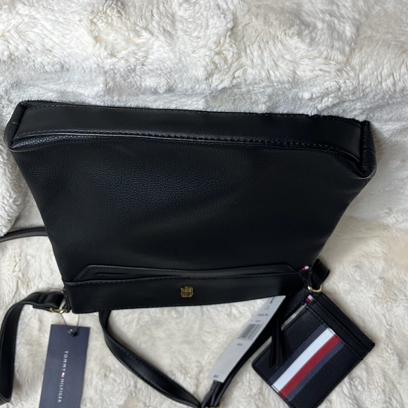Tommy Hilfiger black crossbody with gold detail. Pouch card holder included - Picture 9 of 12
